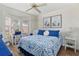 Bright bedroom with bay window and white furniture at 713 Harrington Lake N Dr # 18, Venice, FL 34293