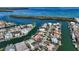 Aerial view of waterfront home with private dock and canal access at 721 Old Compass Rd, Longboat Key, FL 34228