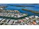 Expansive aerial shot of waterfront homes situated along winding canals, ideal for boaters at 721 Old Compass Rd, Longboat Key, FL 34228