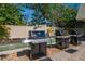 Outdoor grilling area with multiple grills and seating at 757 Beach Rd # 300, Sarasota, FL 34242