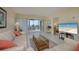 Bright and airy living room offers a relaxing atmosphere and Gulf views at 757 Beach Rd # 300, Sarasota, FL 34242