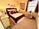 Charming bedroom with a queen-size bed and a nice decor at 7619 Teal Trace, Bradenton, FL 34203