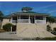 Two-story clubhouse with wrap around porch at 7619 Teal Trace, Bradenton, FL 34203