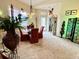 Charming dining area with a table and four chairs at 7619 Teal Trace, Bradenton, FL 34203