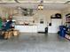 Garage with ample storage and workbench at 7619 Teal Trace, Bradenton, FL 34203