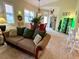 Bright living room with comfortable seating and an open floor plan at 7619 Teal Trace, Bradenton, FL 34203