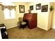 Bright office with wood desk and comfortable chair at 7619 Teal Trace, Bradenton, FL 34203