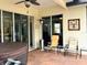 Covered patio with hot tub and access to interior at 7619 Teal Trace, Bradenton, FL 34203