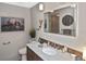 Bathroom with marble-topped vanity and walk-in shower at 796 Capri Isles Blvd # 241, Venice, FL 34292