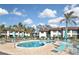 Enjoy the refreshing community pool with plenty of lounge chairs at 796 Capri Isles Blvd # 241, Venice, FL 34292