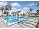 Relax by the inviting community pool, complete with a covered patio at 796 Capri Isles Blvd # 241, Venice, FL 34292