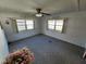 Bright bedroom with carpet and fan at 808 53Rd E Ave # 9, Bradenton, FL 34203