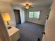 Bedroom with ceiling fan and closet at 808 53Rd E Ave # 9, Bradenton, FL 34203