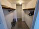 Spacious walk-in closet with ample shelving and hanging space at 808 53Rd E Ave # 9, Bradenton, FL 34203