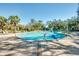 Community pool with accessible lift and plenty of seating at 8501 Starlight Loop, Parrish, FL 34219