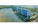 Waterfront condo complex with boat docks and pool at 9393 Midnight Pass Rd # 302, Sarasota, FL 34242