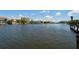 Scenic view of canal with waterfront homes at 9393 Midnight Pass Rd # 302, Sarasota, FL 34242