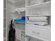 Well-organized closet with ample shelving and storage space at 9393 Midnight Pass Rd # 302, Sarasota, FL 34242