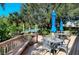 Relaxing deck overlooking a tranquil waterway at 9393 Midnight Pass Rd # 302, Sarasota, FL 34242