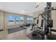 Exercise room with weight machines and a view at 9393 Midnight Pass Rd # 302, Sarasota, FL 34242