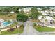 Aerial view of community, pool, and entrance at 96 Drifting Sands Dr, Venice, FL 34293