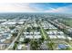 Aerial view showcasing community layout and homes at 96 Drifting Sands Dr, Venice, FL 34293