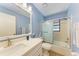 Updated bathroom with white vanity, quartz countertop, and a tub shower at 96 Drifting Sands Dr, Venice, FL 34293