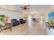 Open living room featuring hardwood floors and comfortable seating at 96 Drifting Sands Dr, Venice, FL 34293