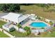 Aerial view of community pool, spa, and clubhouse at 96 Drifting Sands Dr, Venice, FL 34293