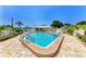 Community pool with patio and surrounding landscaping at 96 Drifting Sands Dr, Venice, FL 34293