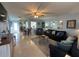 Spacious living room featuring comfortable seating and a coastal décor at 100 The Esplanade N # 6, Venice, FL 34285