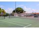 Tennis courts with a person playing a tennis match at 100 The Esplanade N # 6, Venice, FL 34285