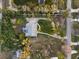 Aerial view of a house with a landscaped yard and walkway at 1021 99Th Nw St, Bradenton, FL 34209