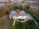 Aerial view of a single-story house with a landscaped yard at 1021 99Th Nw St, Bradenton, FL 34209