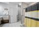 Bathroom with shower, linen closet, and bench at 1021 99Th Nw St, Bradenton, FL 34209