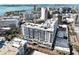 Aerial view of a modern highrise building near the waterfront at 111 S Pineapple Ave # 607, Sarasota, FL 34236