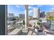 Relaxing balcony with city views and comfortable seating at 111 S Pineapple Ave # 607, Sarasota, FL 34236