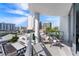 Outdoor balcony furniture with city views at 111 S Pineapple Ave # 607, Sarasota, FL 34236