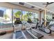 Modern gym with treadmills, ellipticals, and weight machines at 111 S Pineapple Ave # 607, Sarasota, FL 34236