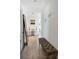 Bright hallway with contemporary decor and bench at 111 S Pineapple Ave # 607, Sarasota, FL 34236