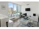 Modern home office with city views and lots of light at 111 S Pineapple Ave # 607, Sarasota, FL 34236