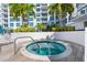 Inviting circular hot tub with surrounding deck at 111 S Pineapple Ave # 607, Sarasota, FL 34236