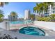 Enjoy this relaxing hot tub with surrounding palm trees at 111 S Pineapple Ave # 607, Sarasota, FL 34236