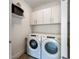 Laundry room with Whirlpool washer and dryer at 111 S Pineapple Ave # 607, Sarasota, FL 34236