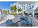 Comfortable outdoor lounge area with seating and city views at 111 S Pineapple Ave # 607, Sarasota, FL 34236