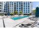 Refreshing pool area with plenty of lounge chairs at 111 S Pineapple Ave # 607, Sarasota, FL 34236