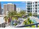 Resort-style pool with plenty of lounge chairs at 111 S Pineapple Ave # 607, Sarasota, FL 34236