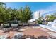 Relaxing public park with benches and brick pavement at 111 S Pineapple Ave # 607, Sarasota, FL 34236