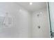 Clean and modern shower with marble tile at 111 S Pineapple Ave # 607, Sarasota, FL 34236