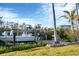 Private boat dock with lift and grassy area at 115 Burns Rd, Terra Ceia, FL 34250